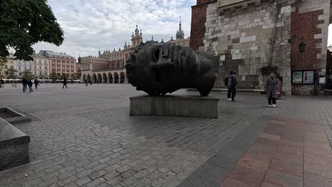 Sculpture-Eros-Bendato-in-Krakow-Central-City-Square,-Poland