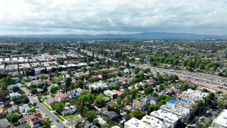 Sherman-Oaks,-California-neighborhood-aerial-flyover-on-a-cloudy-day