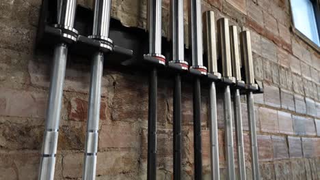 Barbells-lined-up-at-gym