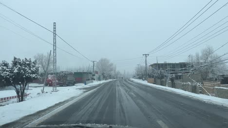 Street-view-of-snowfall-in-Skardu-City,-Pakistan