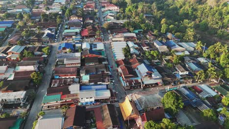 Aerial-view-of-a-serene-neighborhood-in-Songklaburi,-Thailand,-showcasing-its-peaceful-ambiance-and-local-charm