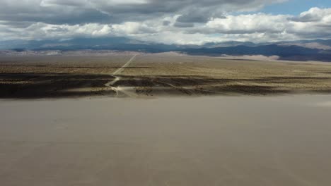 Long-road-from-Argentina-mountains-to-flat-sandy-Arroyo-El-Leoncito