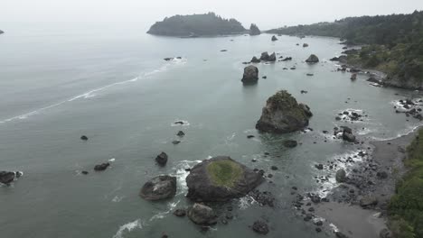 Aerial-view-of-cloudy-day-in-Rocky-coast-of-Trinidad-bay,-Oregon,-USA