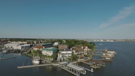 An-aerial-view-of-waterfront-homes-on-Clear-Lake-under-blue-skies-in-late-afternoon-in-Seabrook,-Texas