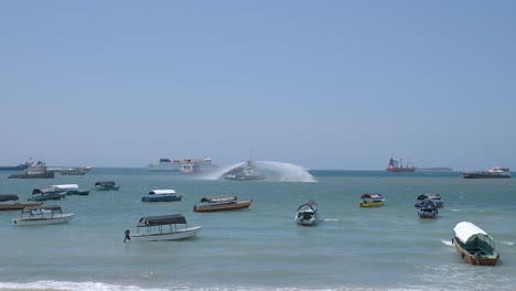 Traditional-Boats-In-The-Coastal-Waters-Of-Stone-Town-In-Zanzibar,-Tanzania,-East-Africa