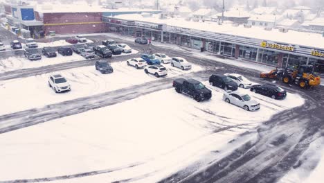 Supermarket-car-park-affected-by-spring-snow-storm-in-Longueuil-Canada