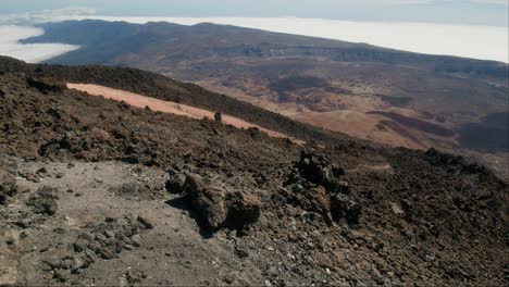 Dry-barren-volcanic-landscape,-Crater-bellow-Pico-del-Teide-on-Tenerife,-Canary-Islands