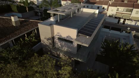 Aerial-reverse-shot-of-modern-house-in-Rincon-de-la-Victoria,-Malaga-Spain