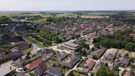 Aerial-parallax-over-neighborhood-in-small-village-of-Batya,-Hungary