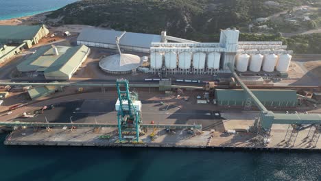 Industrial-port-with-crane-beside-grain-factory-in-Esperance-Town,Western-Australia