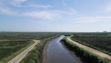 Aerial-view-of-a-calm-water-channel-near-Veiros-village,-Estarreja,-Portugal