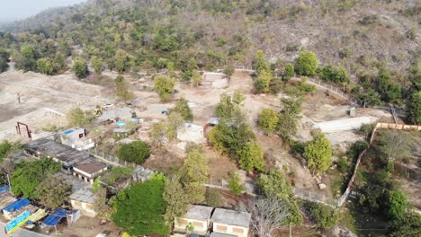 Aerial-shot-of-an-isolated-city-in-rural-India-situated-on-mountains-during-daytime