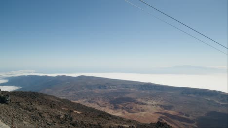Volcanic-crater-panorama-landscape-with-cable-car-on-a-peak-Pico-del-Teide-on-Tenerife,-Canary-Islands-in-spring