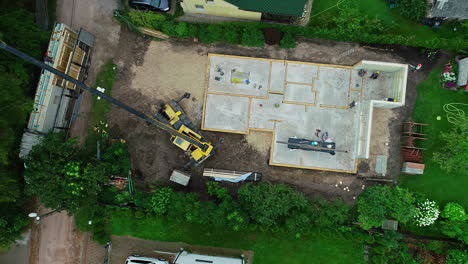 Above-View-Of-A-Hydraulic-Tractor-Crane-Working-In-Construction-Site