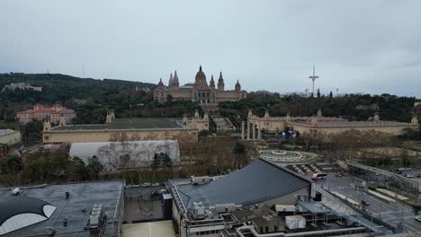 National-art-museum-in-barcelona-with-overcast-sky,-cityscape,-aerial-view