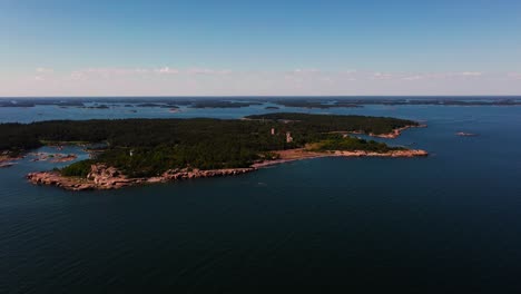 Aerial-view-in-front-of-the-Jussaro-island,-sunny,-summer-day-in-Uusimaa,-Finland