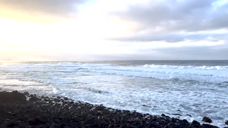 Scenic-view-of-ocean-waves-crashing-against-the-shoreline,-illustrating-the-concept-of-natural-beauty-and-serenity