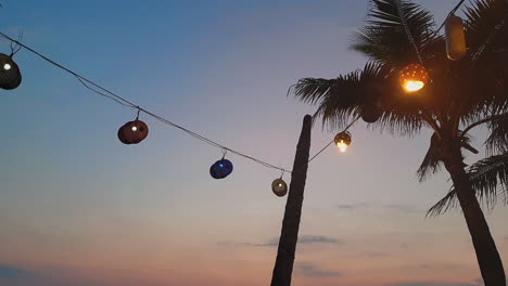 Static-view-of-lanterns-hanging-in-a-circle-in-magnificent-sunset