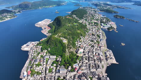 Aerial-View-of-Alesund,-Norway,-Scenic-City-on-Islands,-Buildings-and-Coastline,-Drone-Shot