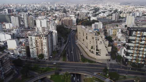 Aerial-shot-of-a-street-called-"Subida-Armendariz"-which-leads-from-the-coast-into-the-city-of-Lima,-Peru