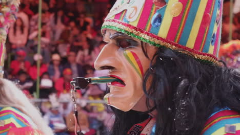 Indigenous-mask,-headdress-costumes-in-Oruro-Carnival-parade,-Bolivia