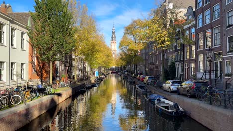 Wide-angle-picturesque-establishing-shot-of-Amsterdam-city-and-canals-in-summer-sunshine