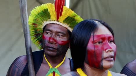 An-indigenous-amazon-man-and-woman-with-colorful-painted-faces