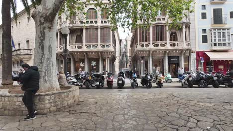 Street-In-Palma-De-Mallorca-With-Casasayas-And-Pension-Menorquina,-Two-Buildings-Gaudi-Art-Nouveau-Style-Buildings