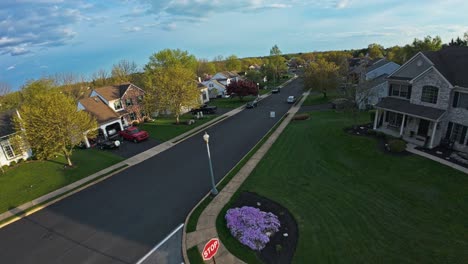 Sunlight-on-quiet-morning-in-american-residential-area-with-large-homes-during-spring-season