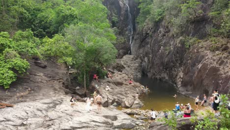 Aerial-View-Of-Tourists-Enjoying-Creek-At-Khlong-Phu-Waterfall