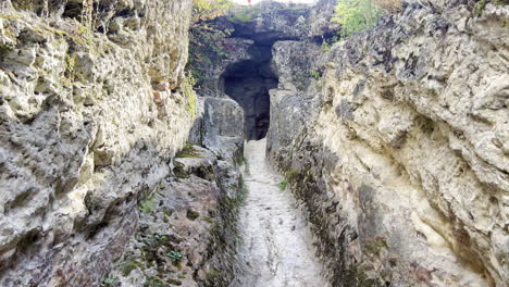 Moving-shot-with-the-entrance-of-Roman-thermal-baths-in-Geoagiu---Bai,-Romania