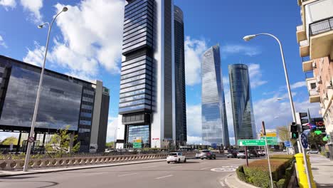 Busy-Crossing-in-Modern-Cuatro-Torres-Business-Area-of-Madrid,-Spain