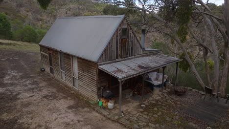 AERIAL-Small-Timber-Hut-In-the-Middle-Of-Australia-Wilderness-Bushland