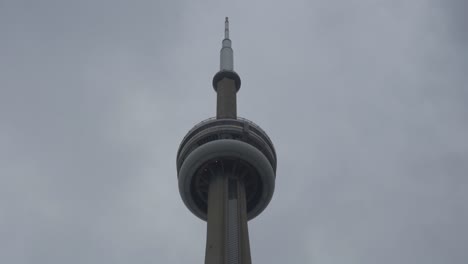 Closeup-Of-Cn-Tower-In-Downtown-Toronto,-Zooming-Out-Shot