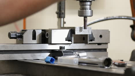 Close-up-of-a-milling-machine-in-operation-with-sharp-metal-parts