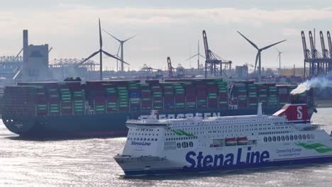 Evergreen-Container-Ship-And-MV-Stena-Hollandica-Ferry-In-Hoek-van-Holland,-Netherlands---Drone-Shot