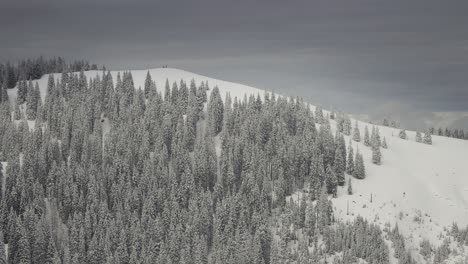 Hikers-on-top-of-the-snow-covered-hill-in-the-Austrian-Alps