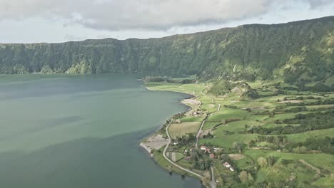 Sete-Cidades-settlement-on-Blue-Lake-or-Lagoa-Azul-shores,-Ponta-Delgada-municipality,-Sao-Miguel-island,-Portuguese-Azores-archipelago,-Portugal