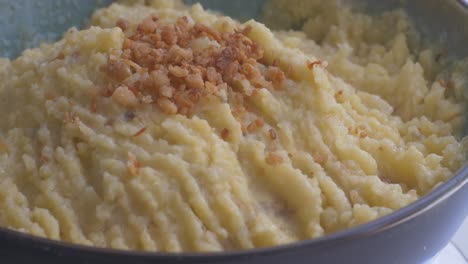 Ready-Mashed-Banana-plantain-puree-on-a-turning-table,-fast-forward