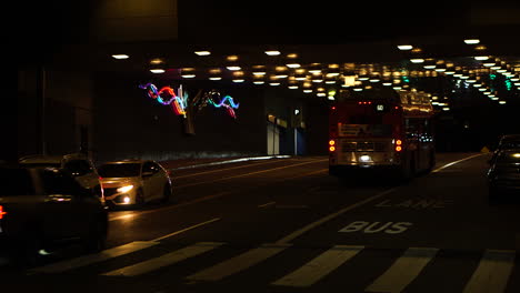 Los-Angeles-CA-USA,-Night-Traffic-on-South-Olive-Street-Tunnel-Under-Bunker-Hill