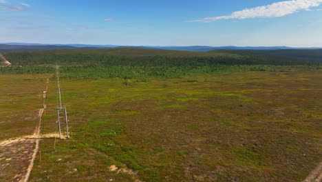 Drone-flying-over-arctic-fells-and-polar-nature,-summer-in-Saariselka,-Lapland