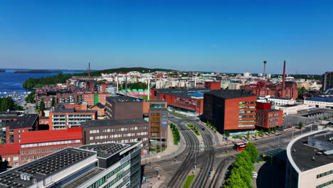 Drone-shot-in-front-of-the-Ratina-district,-in-sunny-Tampere,-Pirkanmaa,-Finland