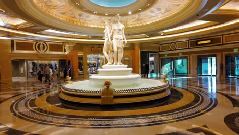 POV-Walking-Around-Statues-In-Lobby-At-Caesars-Palace-Casino