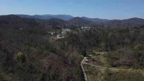 Aerial-view-of-winding-road-leading-to-luxury-campsite-resort-in-Pigeon-Forge,-Tennessee