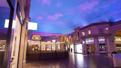 POV-Walking-Past-Illuminated-Shops-Inside-Caesars-Palace-Casino