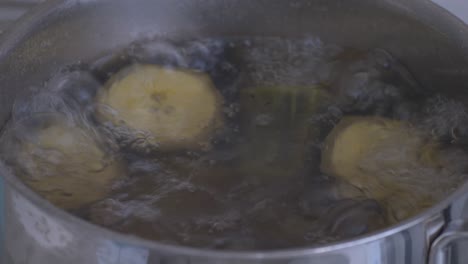 Boiling-plantain-banana-to-make-banana-puree,-part-3