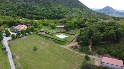 Aerial-view-of-property-with-swimming-pool,-wedding-event-in-the-Euganean-Hills,-Italy