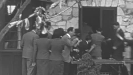 Group-of-People-Run-Into-a-House-During-a-Social-Gathering-of-Great-Depression