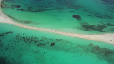 Cayo-de-agua,-turquoise-waters-and-sandy-beach,-tranquil-paradise,-aerial-view