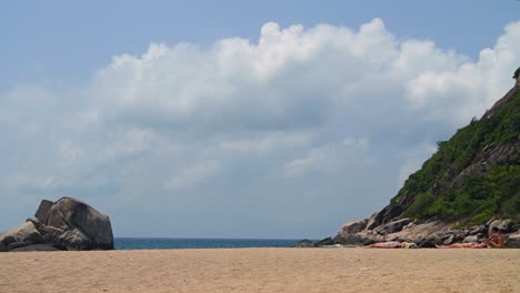 Beautiful-scenery-at-sandy-beach-with-high-clouds